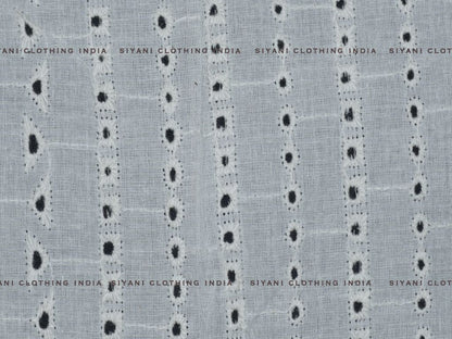 Siyani Kora Cotton Dyeable Cutwork Holes And Triangle Chikankari Embroidered Fabric